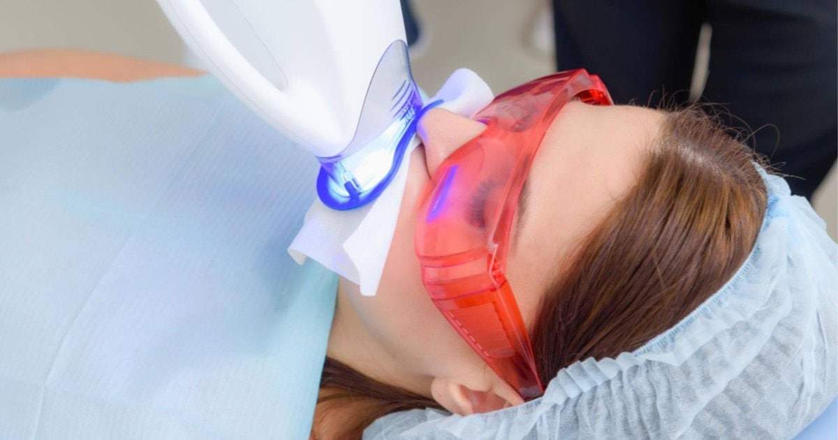 Patient undergoing LED teeth whitening in Cardiff
